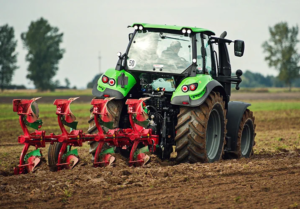 Using a tractor implement for soil preparation