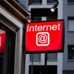 Internet LED signage beside building near buildings