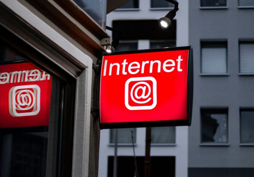 Internet LED signage beside building near buildings