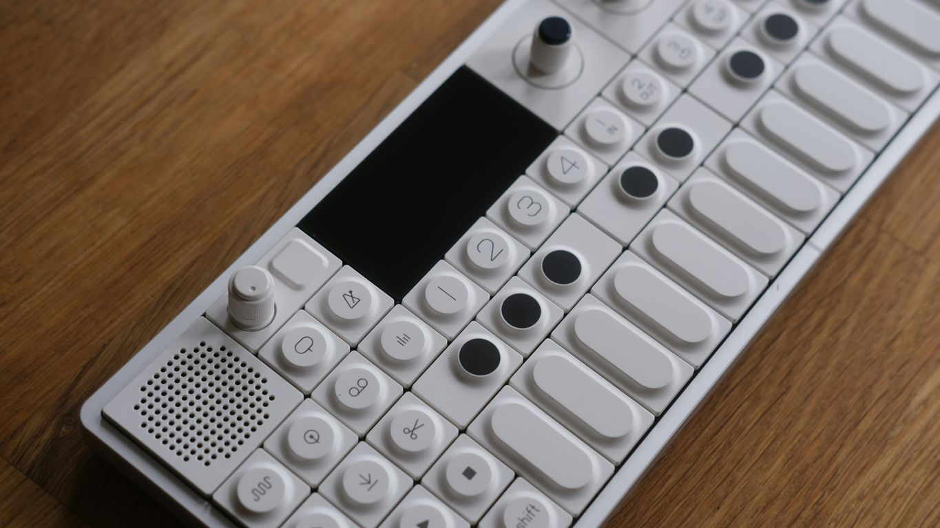 a remote control sitting on top of a wooden table